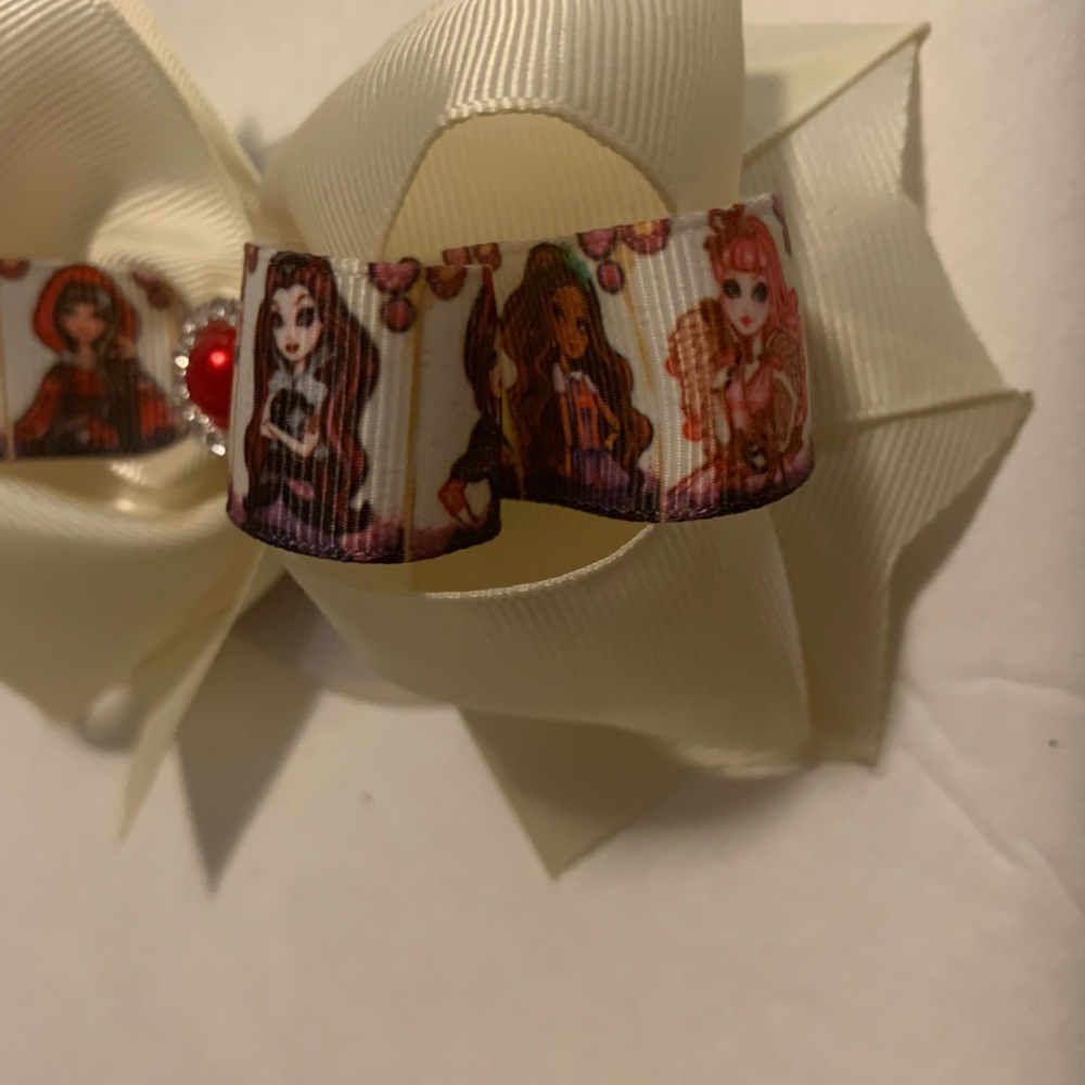 Girls cream color hair bow with ever after high character ribbon